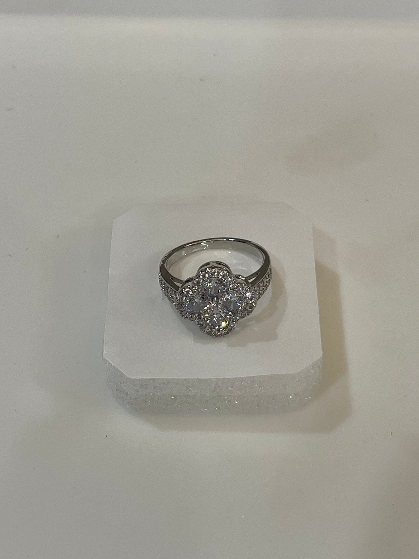 Silver plated ring with gemstones.