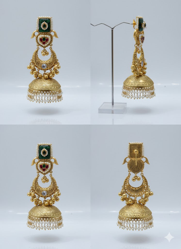 Gold toned earrings with green and red gemstones and tiny white pearls