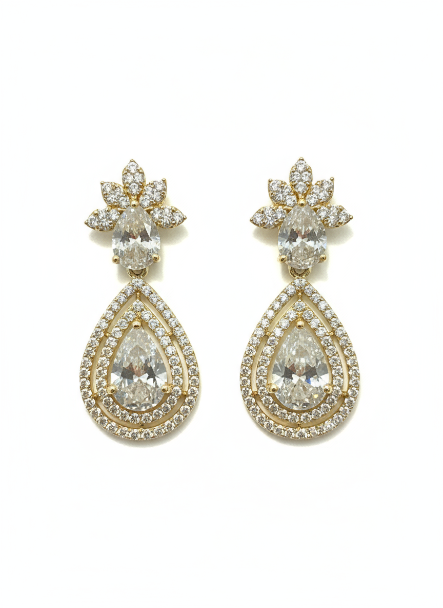 Gold finish earring with clear gemstones.