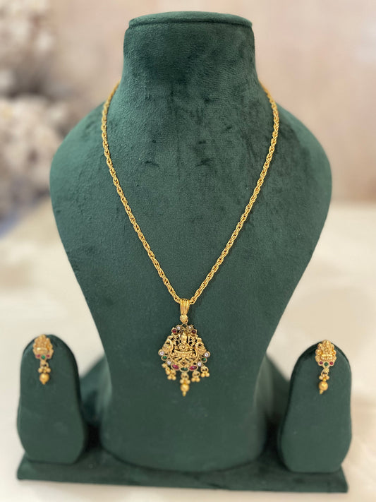 Golden Chain with pendant and matching earrings.