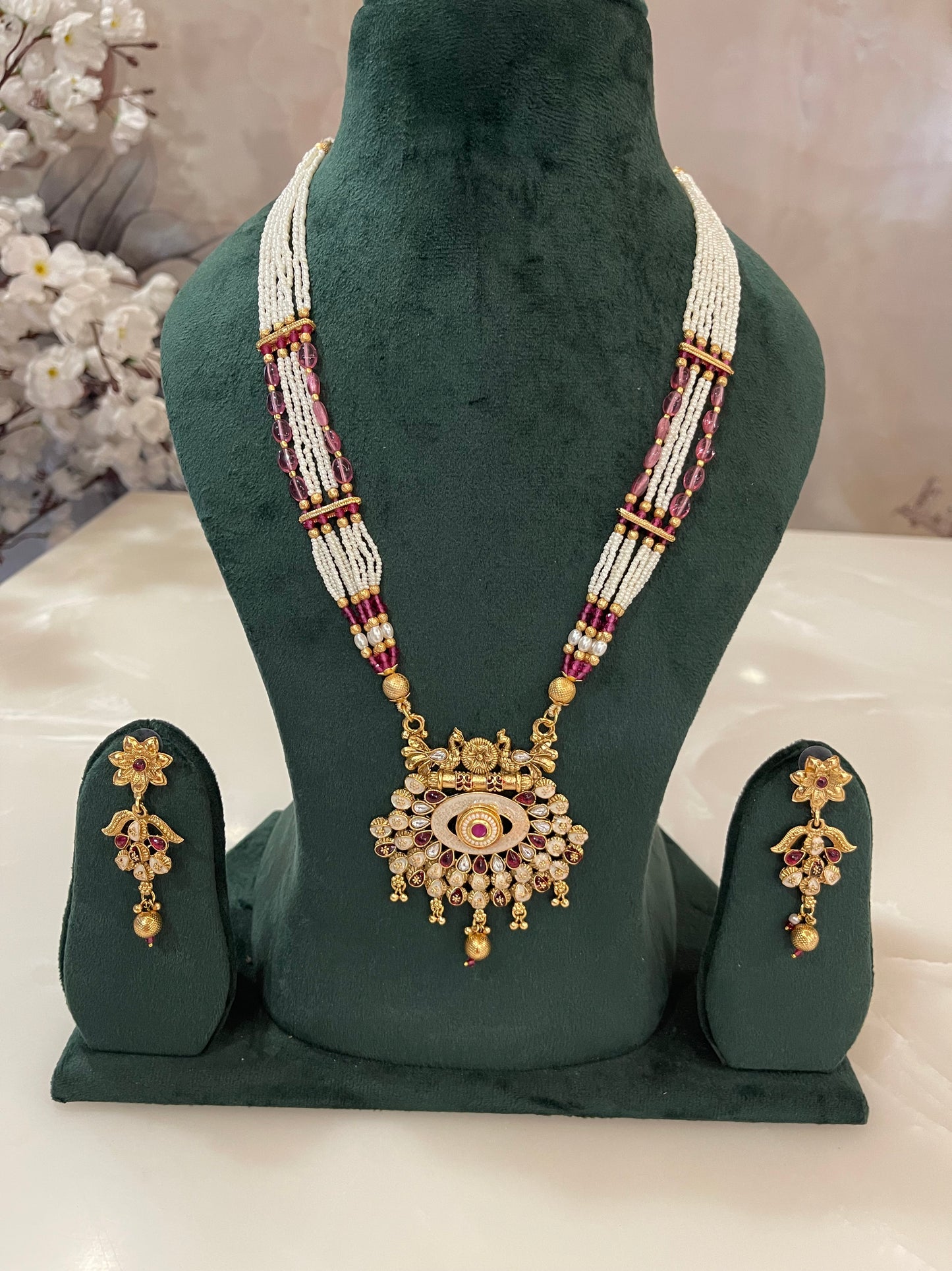 Beads Necklace with Golden Pendant and matching earrings.