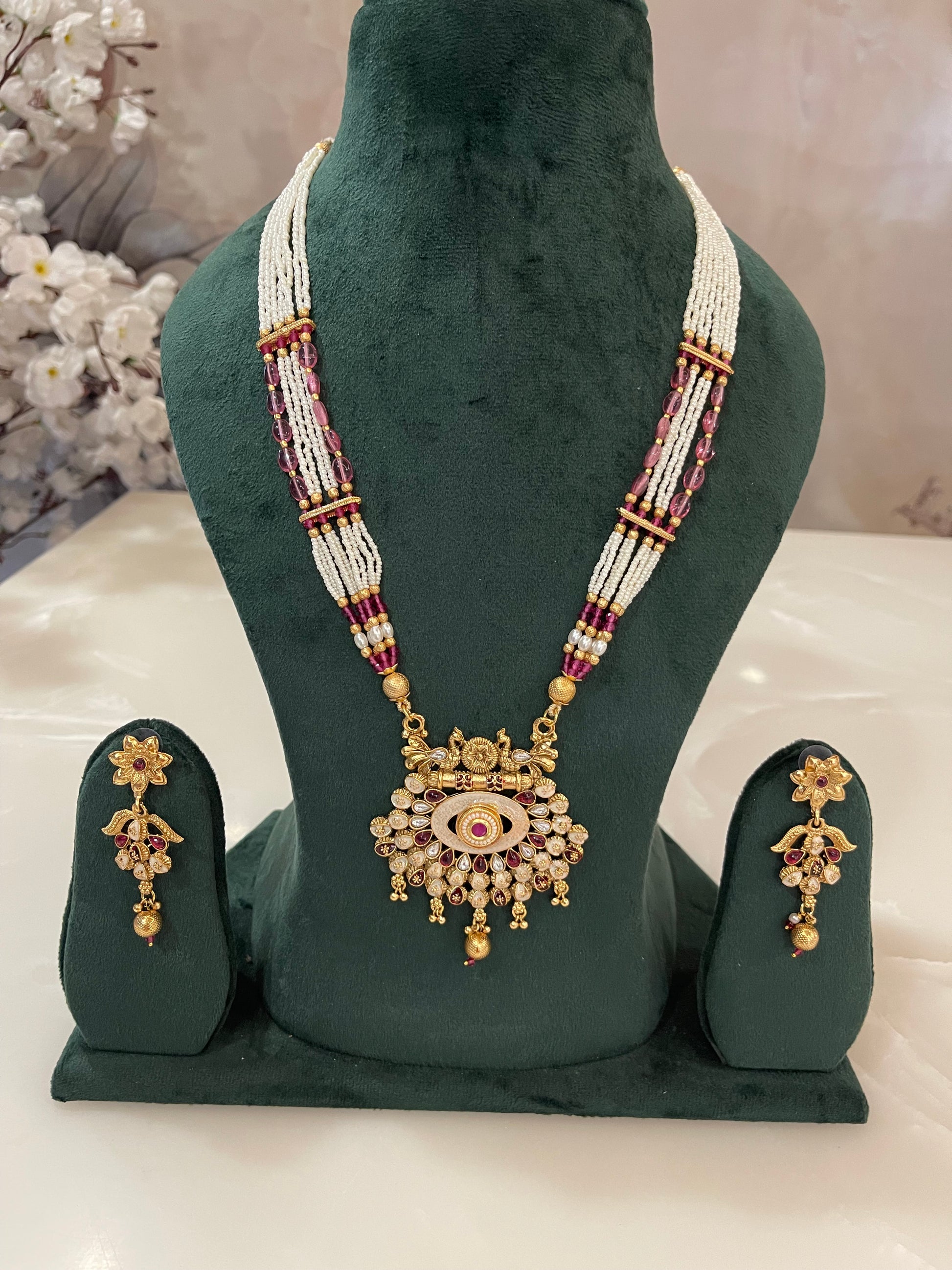 Beads Necklace with Golden Pendant and matching earrings.