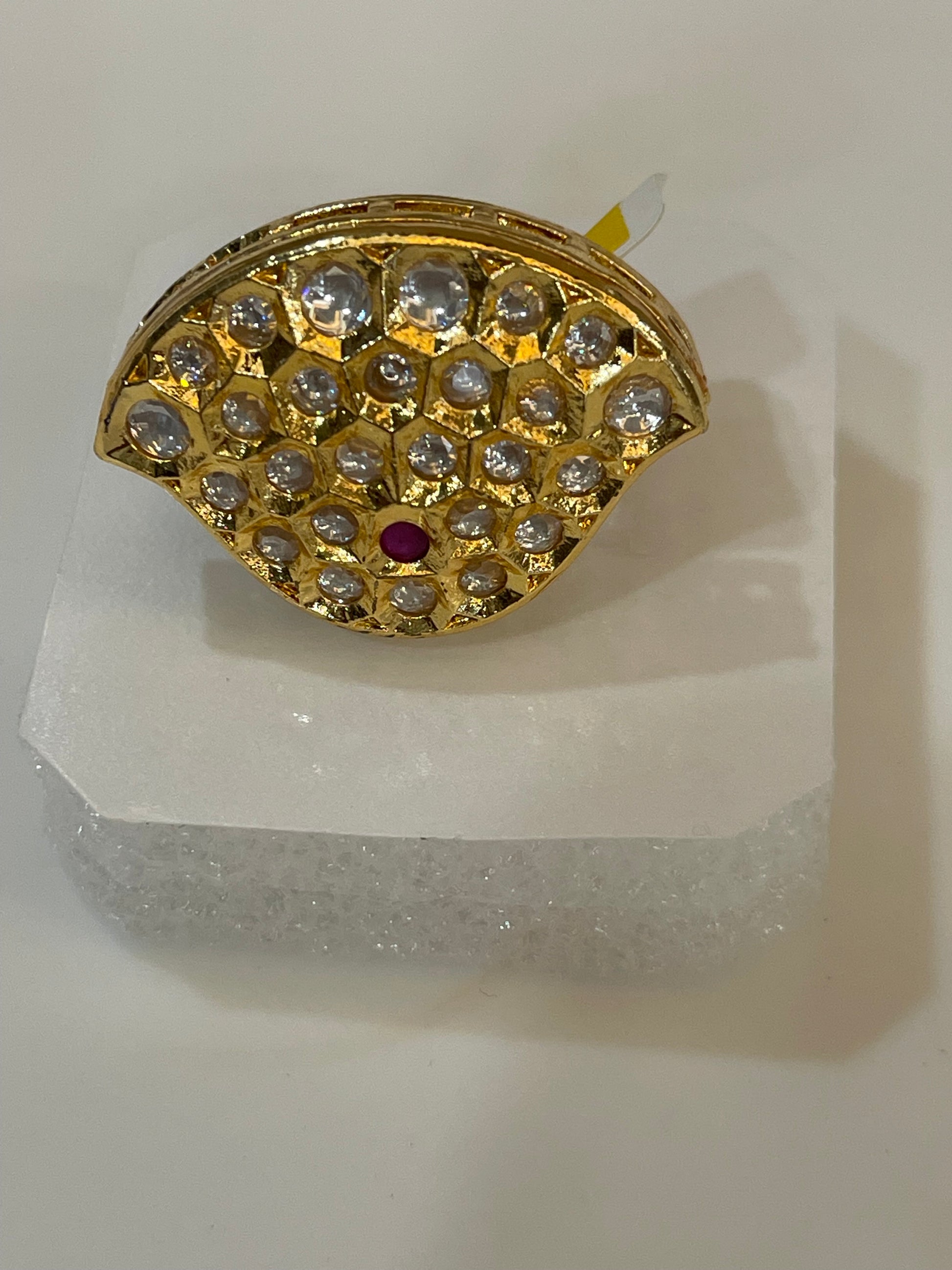 Golden ring with gemstones 