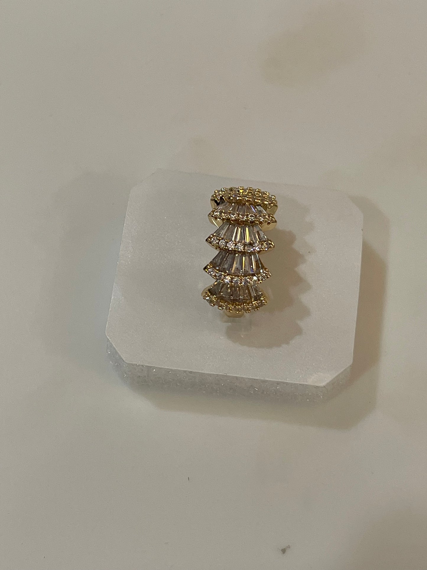 Golden ring with clear stones accents 