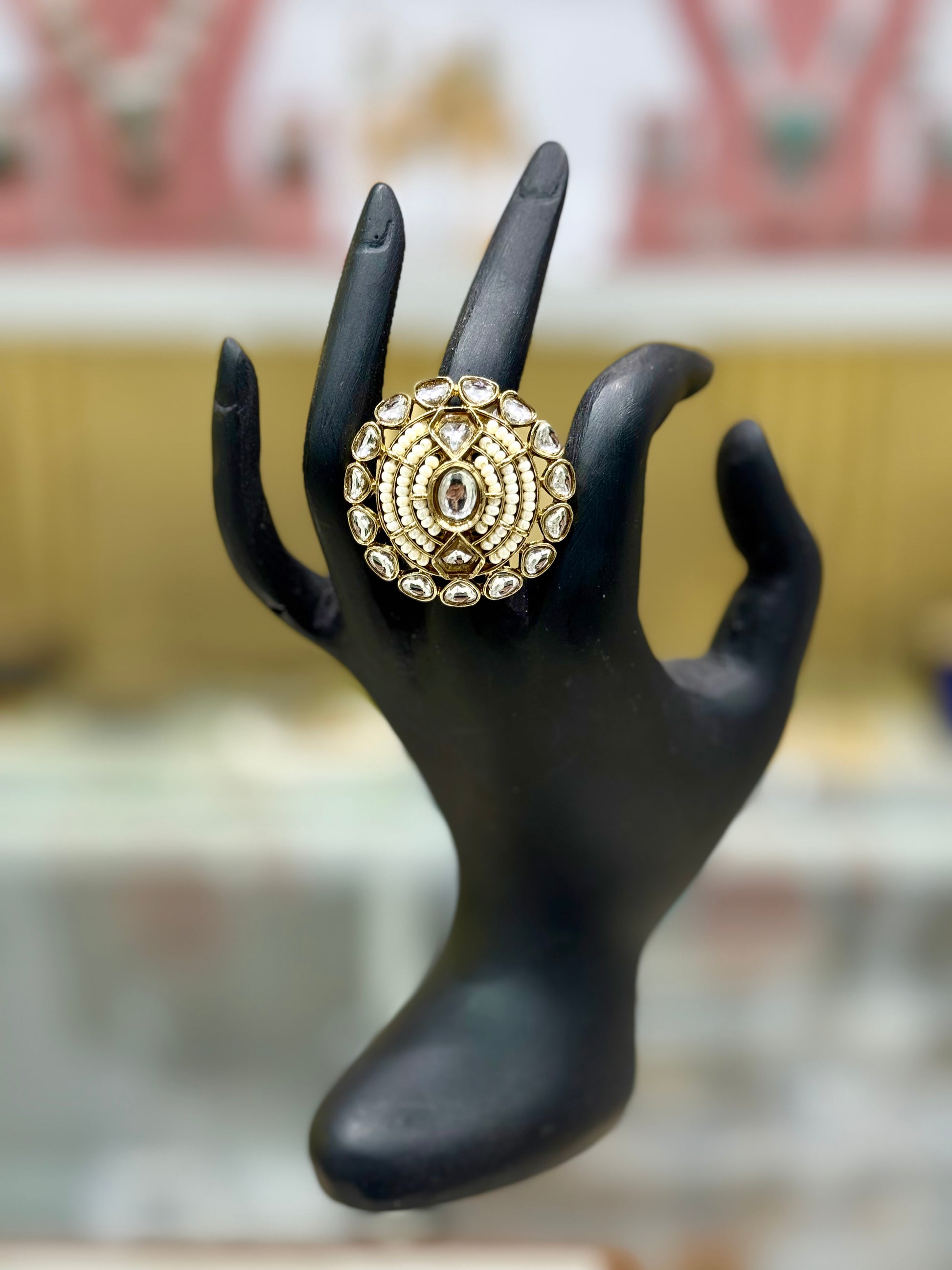 Kundan Pearl ring with golden plating, anti-tarnish finish, and adjustable size, featuring intricate Kundan craftsmanship with bequtiful pearls