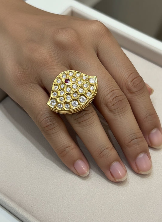 Gold ring with studded clear stones sweeping fan silhouette 